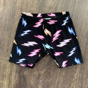 NWT Dot Dot Smile KICK SHORTS. Colorful Lightening Bolts on Black. SIZE 3/4